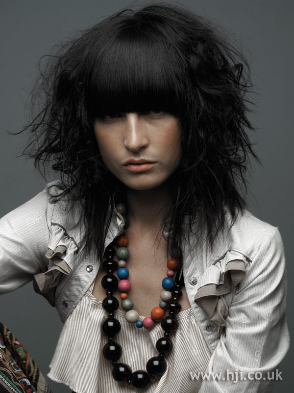 авангардные прически. фактурные прически. статичные прически. 2010 год прически. пучок на голове.