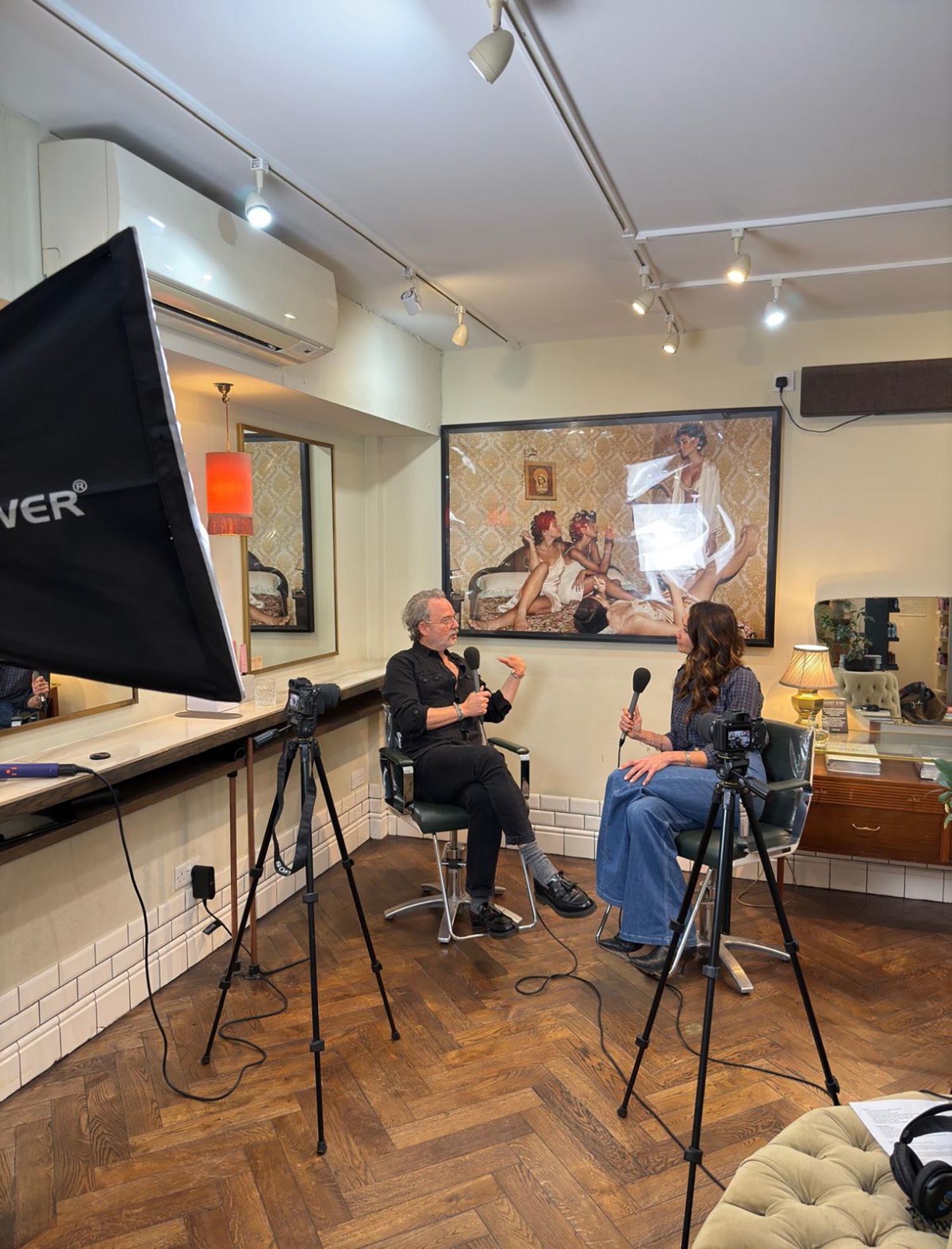 Andreas Wild interviewing on his podcast, Salon Confidential