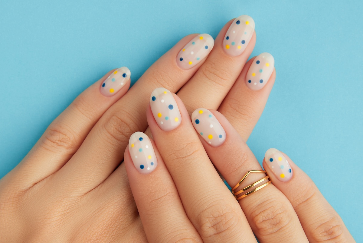 Close-up of polka dot nails, a key Autumn 2025 beauty trend