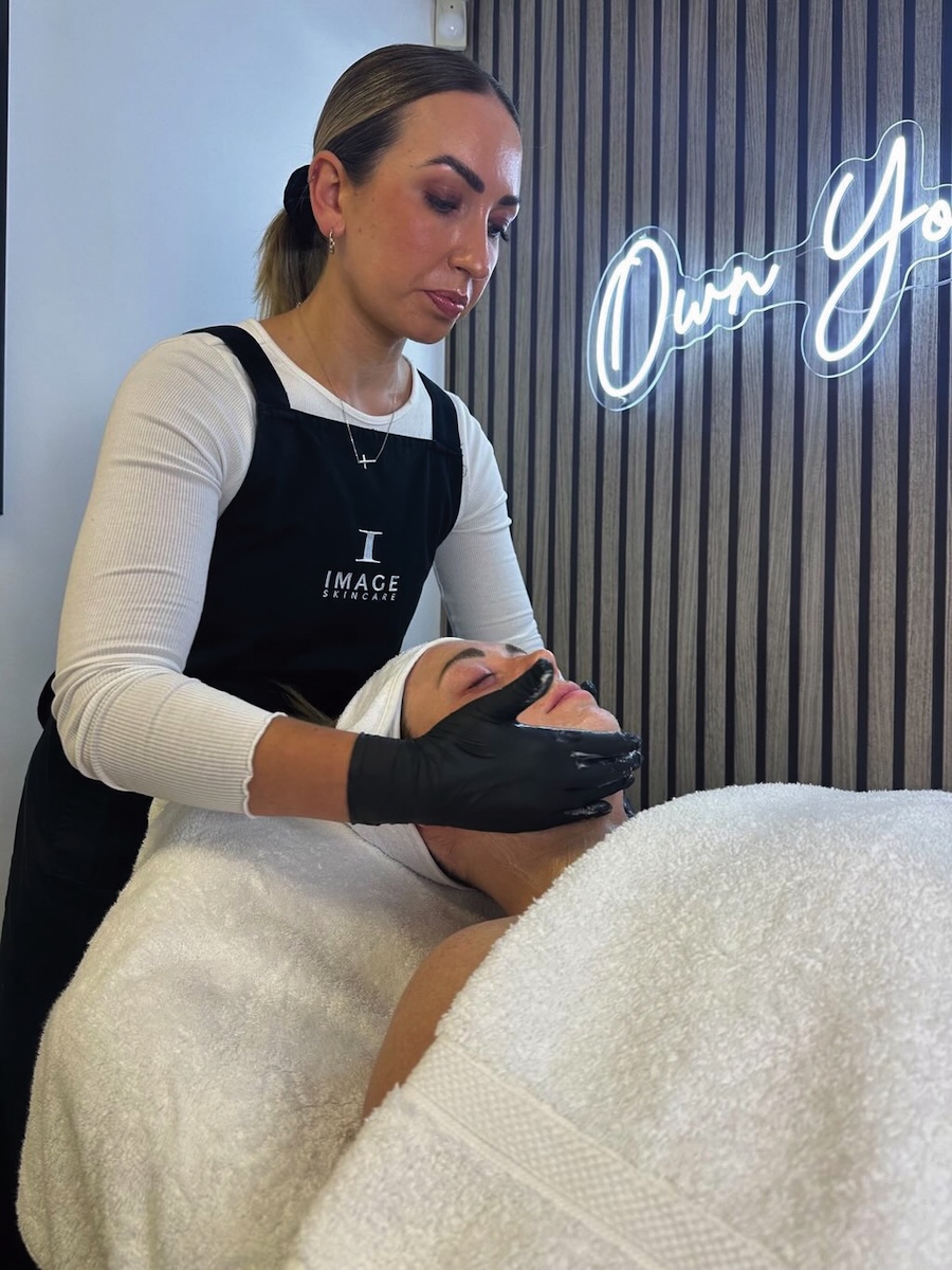 Jessica Mee, owner of JM MediSpa in Blyth, performing a facial treatment on a client, demonstrating professional skincare and aesthetics expertise