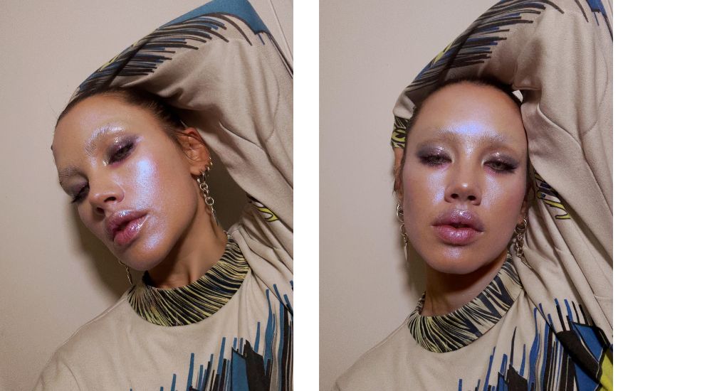 Futuristic makeup look from makeup artist Isamaya Ffrench, with bleached eyebrows, iridescent skin, metallic eyes