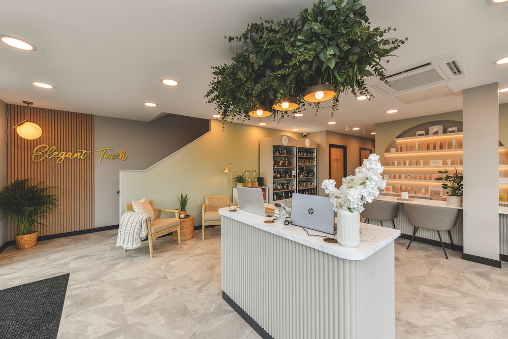 Reception area of Elegant Touch Beauty salon in Derbyshire with welcoming décor and retail display