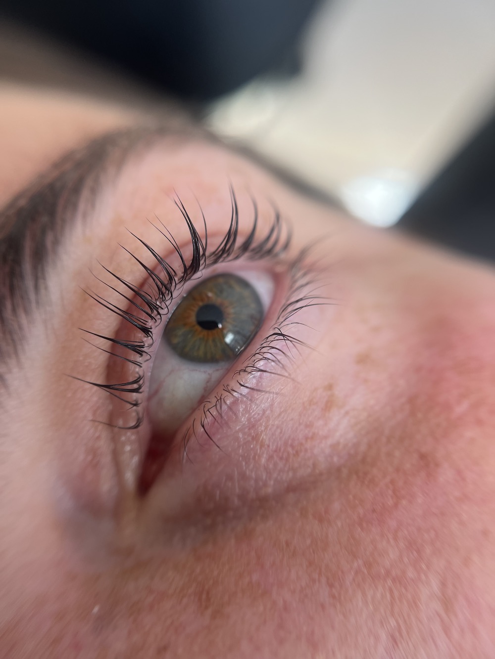 Close up of long black eyelashes following a lash lift