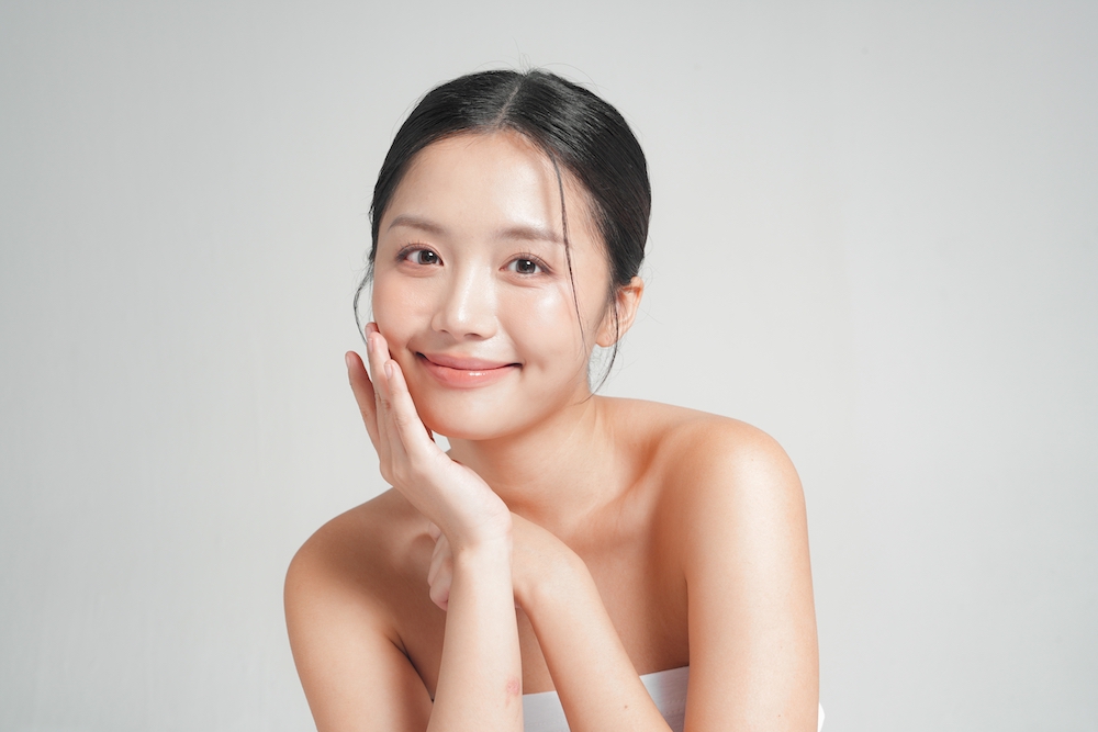 Photo of Korean woman with glowing, glass skin