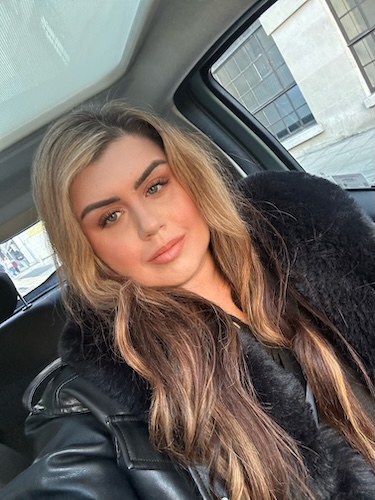 Portrait of Amy Rachel Kane, a Leeds-based beauty journalist with a background in makeup artistry