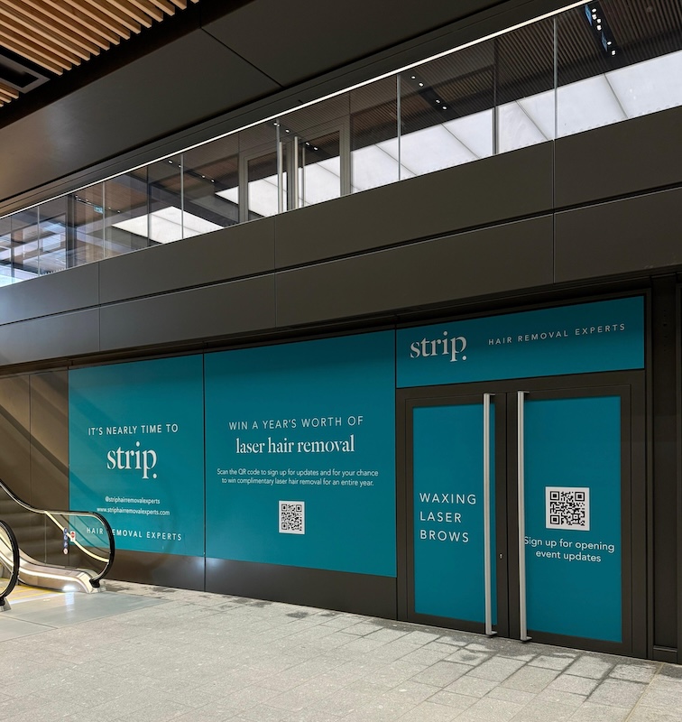 Hoarding outside Strip Hair Removal Experts Broadgate Central during salon fit-out