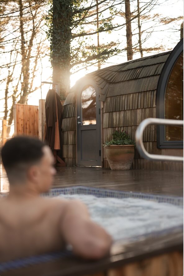 Man in hot tub at Galgorm Forest Garden Spa