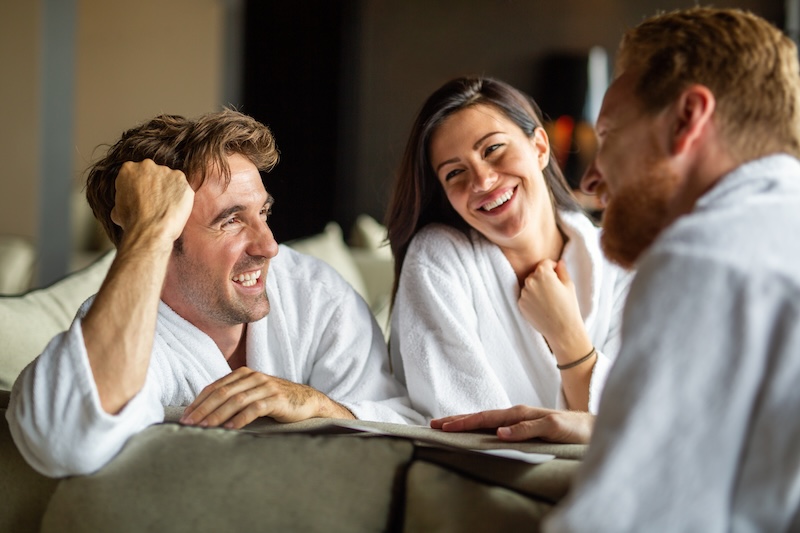 Group of friends enjoying a spa contrast therapy session with hot and cold treatments for relaxation, recovery, and wellbeing