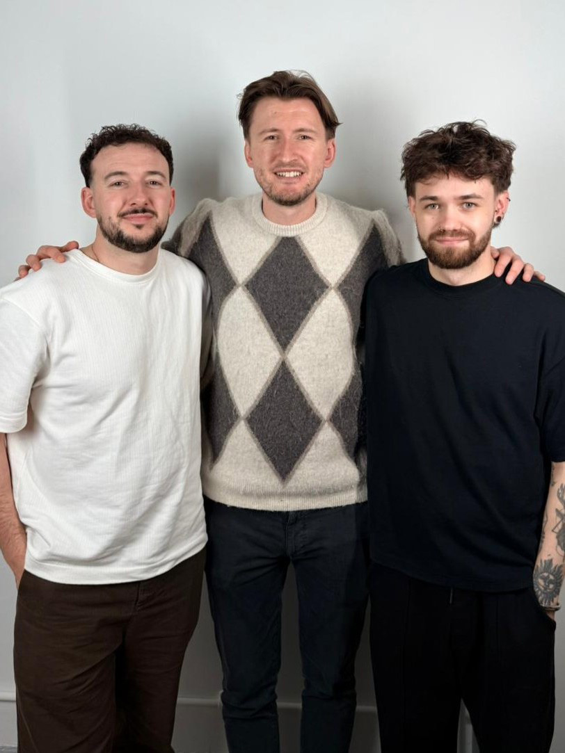 Charles Rose with team members