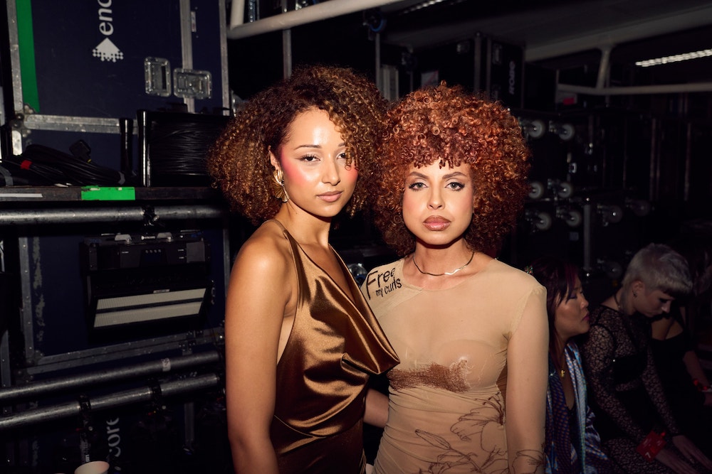 Two models backstage at a Wella Professionals TrendVision final