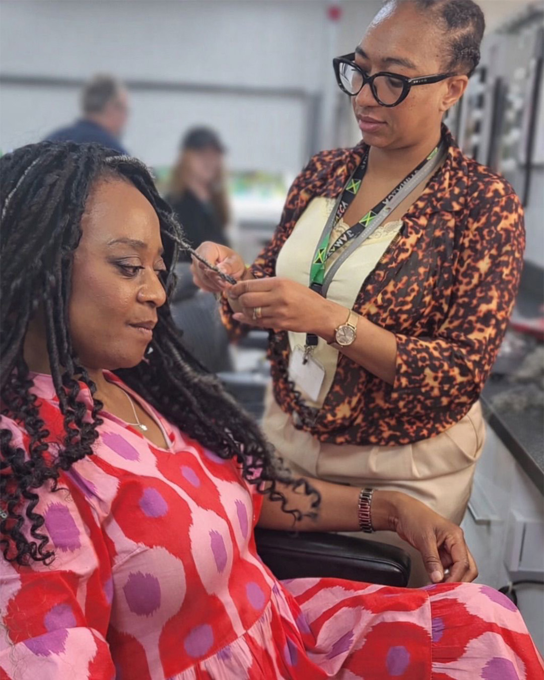 Tamara Robinson Working on Hair on Set
