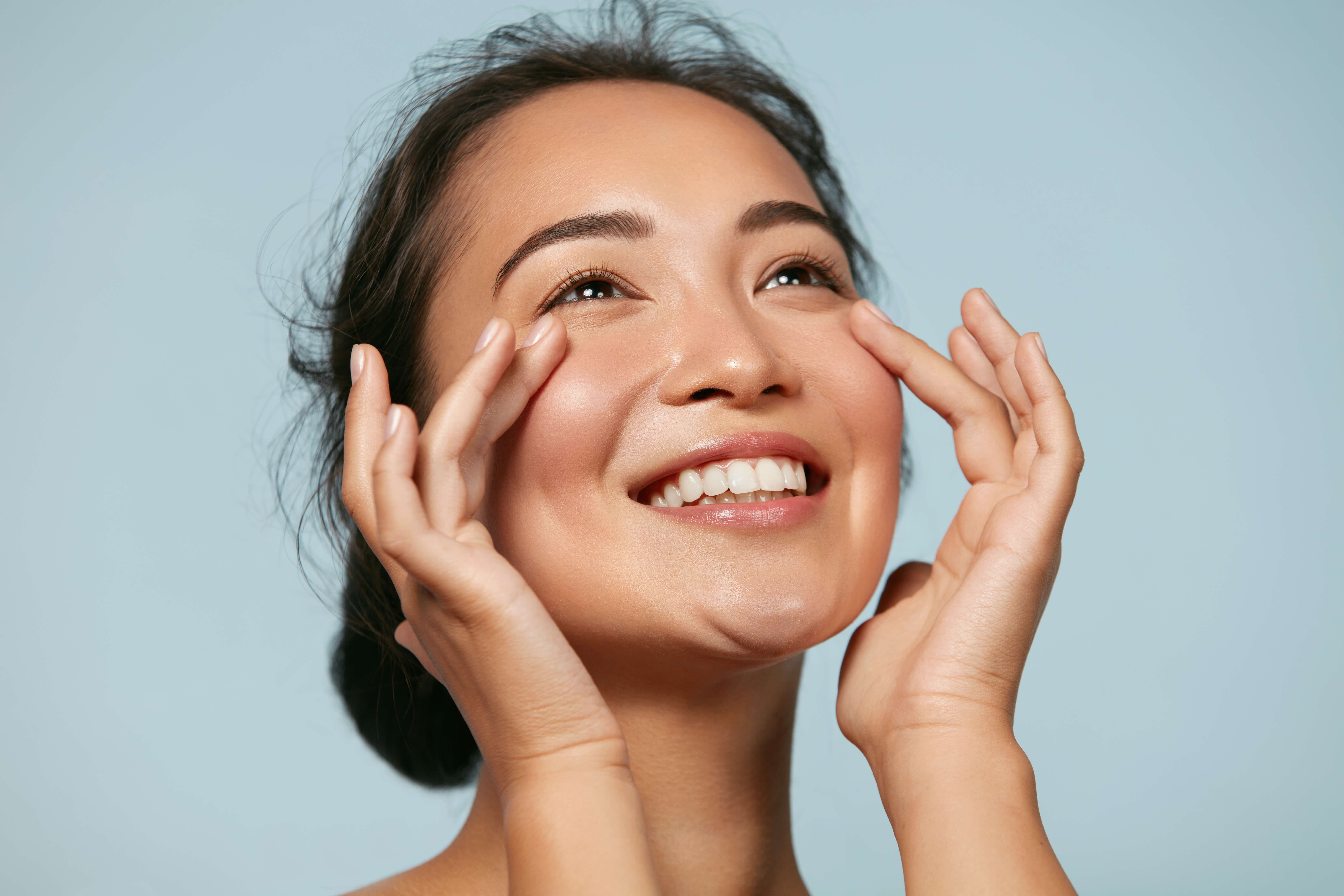 lady smiling glowing skin