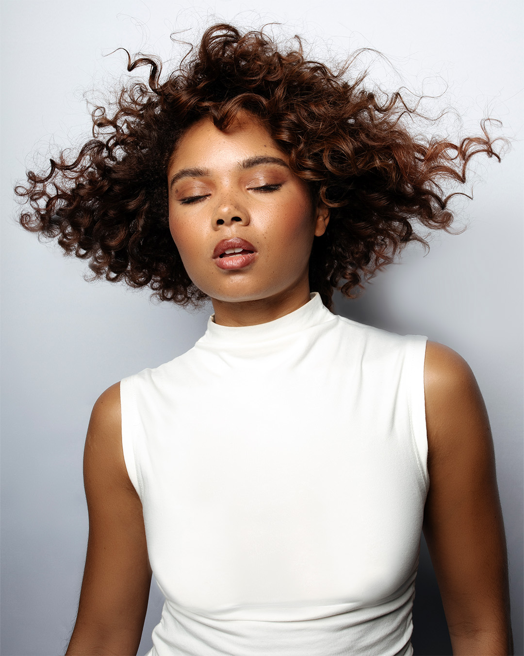Brunette layered curly bob