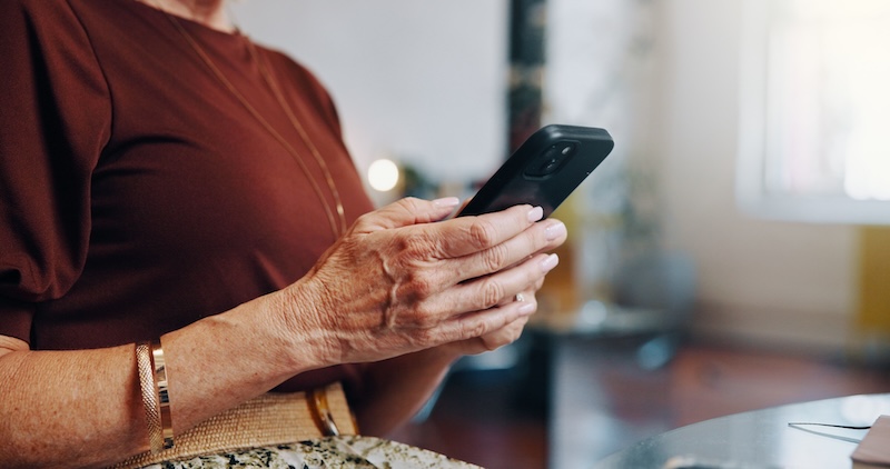 Woman scrolling on her phone