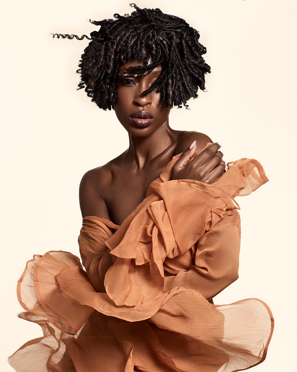 Mid length twisted spiral curl bob with subtle copper highlights from Melissa Timperley and Sara Williams