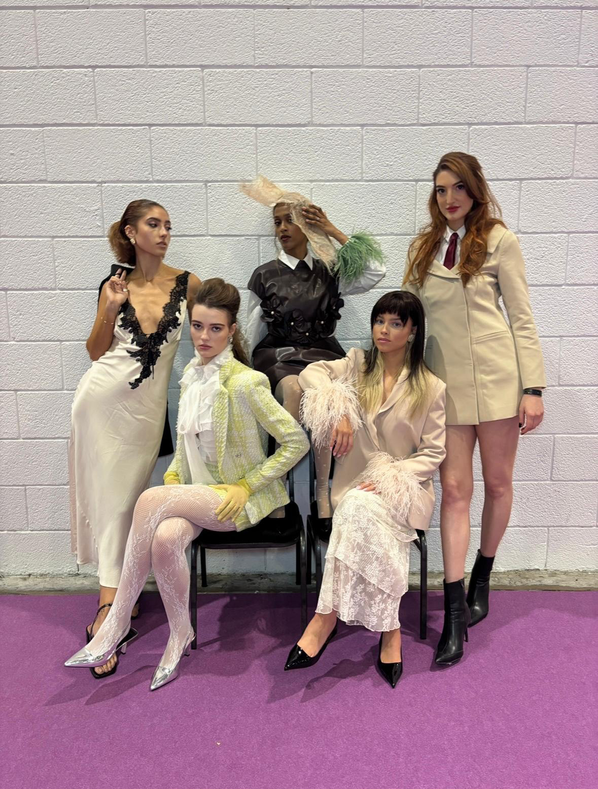Five models showcase a range of polished hair looks and fashion-forward styling on the Trends Stage at Salon International 2026.